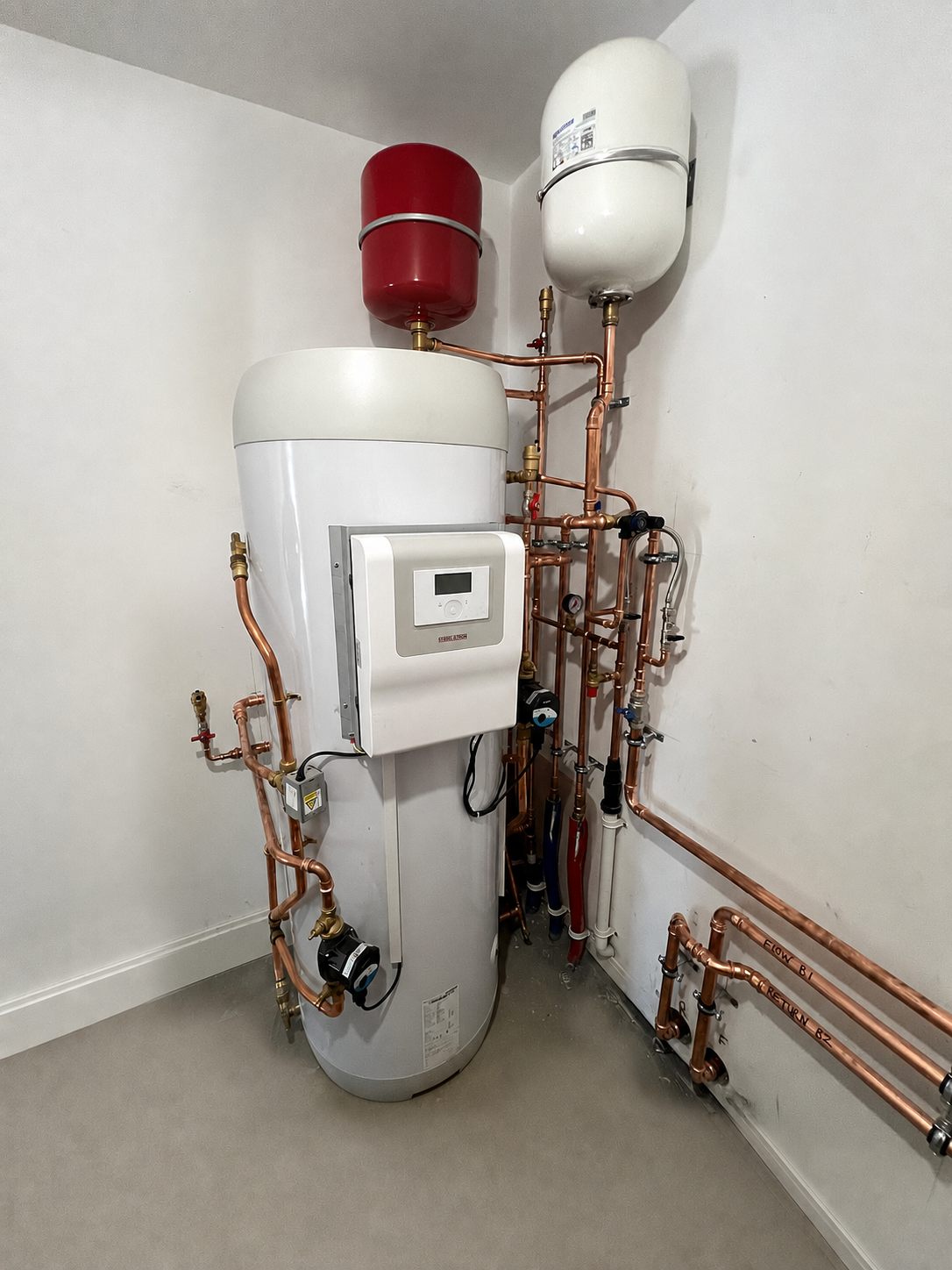 Studio plant room with Stiebel Eltron hot water cylinder and pipework